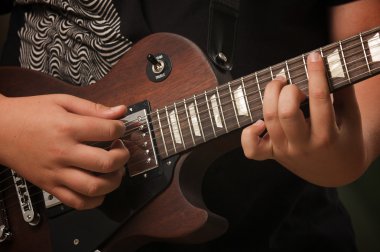 Musician Plays His Gibson Guitar clipart