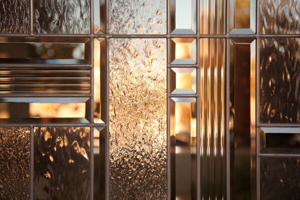 Beautiful Beveled Glass Window with Warm Reflect