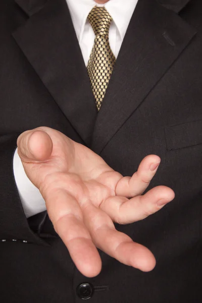 Empresario con abrigo y gestos de corbata — Foto de Stock