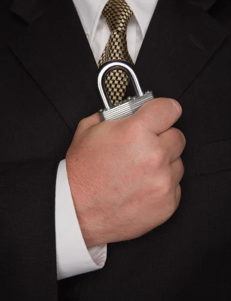 Businessman Close-up Gripping Lock — Stock Photo, Image