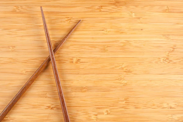 Chop Sticks on Bamboo Surface Background — Stock Photo, Image