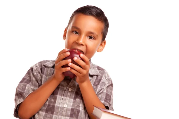 Schattig latino jongen eten van een appel — Stockfoto