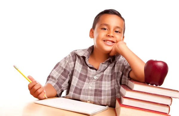 Lilla spansktalande pojke, böcker, & apple — Stockfoto