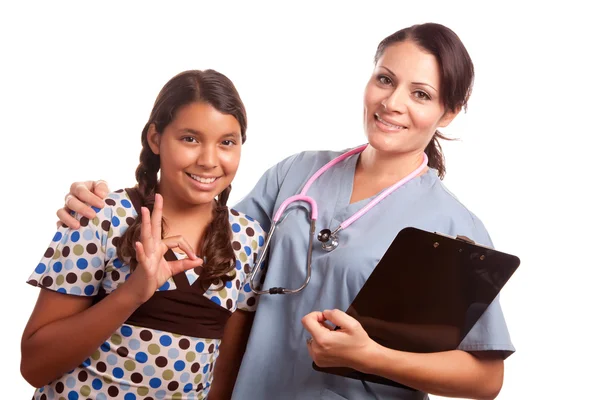 Pretty Hispanic Girl and Female Doctor — Stock Photo, Image