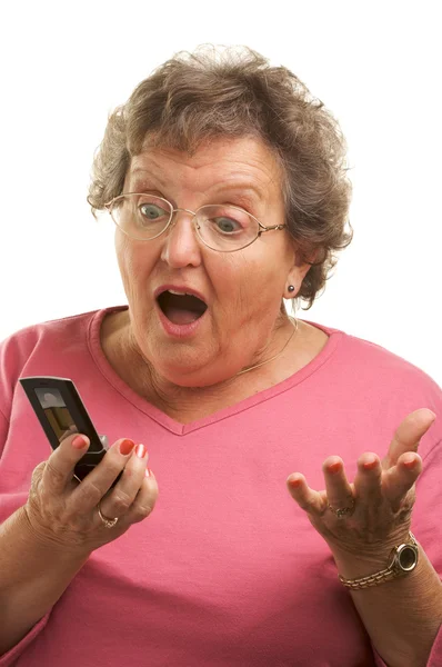 Mujer mayor emocionada usando teléfono celular —  Fotos de Stock