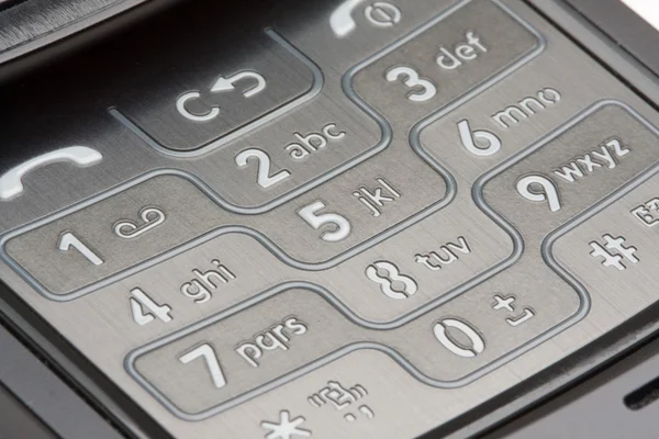 Almohadilla de número de teléfono celular detallada gris Macro —  Fotos de Stock