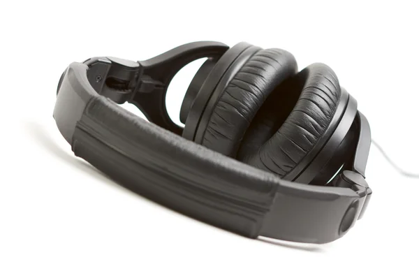 Paire d'écouteurs noirs sur blanc — Photo
