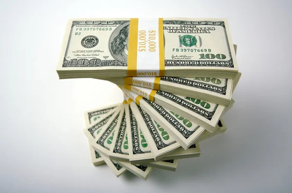 Montones de billetes de cien dólares — Foto de Stock