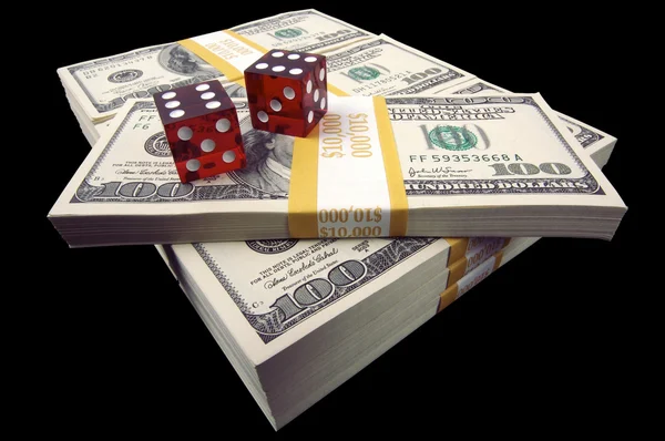 Stacks of Money and Red Dice on Black — Stock Photo, Image