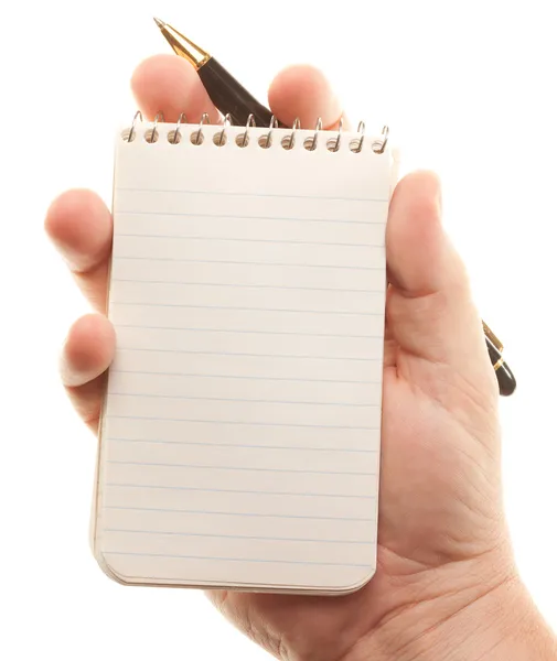 Mannelijke handen met pen en notitieblok — Stockfoto