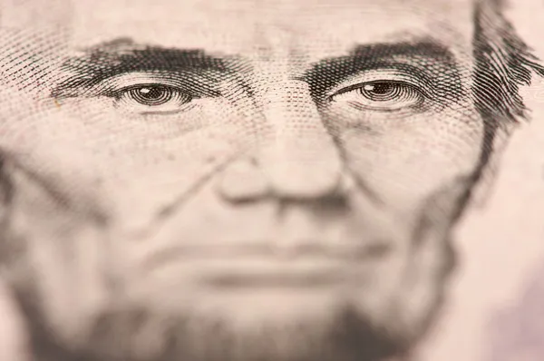 Abe lincoln öt USA-dollár-bill — Stock Fotó