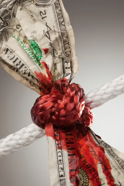 Skrynkliga dollarn bundet och blödning — Stockfoto