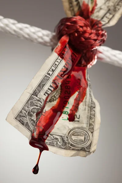 Dólar enrugado amarrado e sangramento — Fotografia de Stock