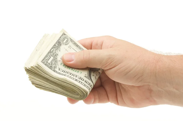 Masculino entregando sobre pilha de dinheiro — Fotografia de Stock