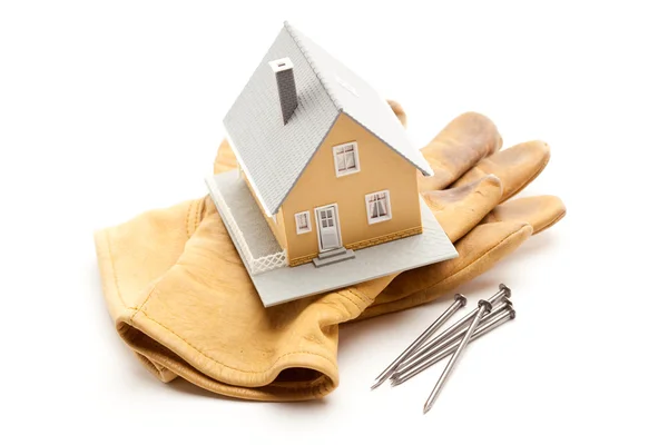House, Gloves and Nails on White — Stock Photo, Image