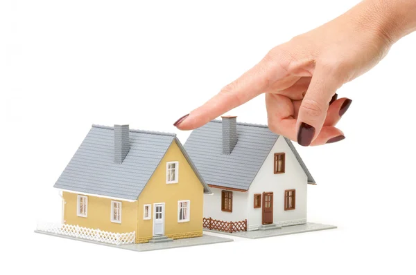 Female Hand Pointing At A Home — Stock Photo, Image