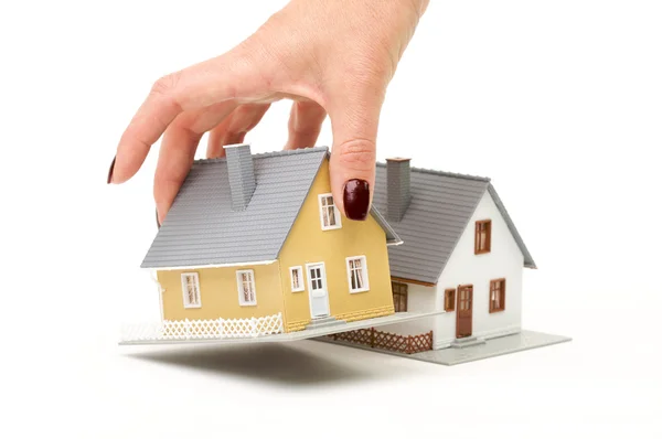 Female Hand Choosing A Home — Stock Photo, Image