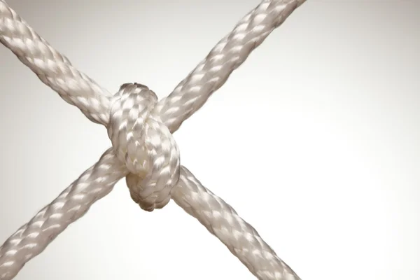 Nylon Rope Knot on a Spot Lit Background. — Stock Photo, Image