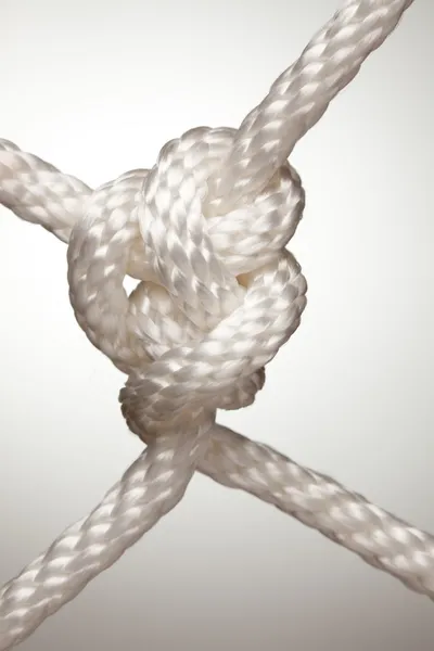 Nylon Rope Knot on a Spot Lit Background — Stock Photo, Image