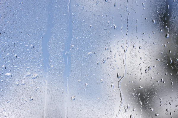 Regendruppels op het raam — Stockfoto