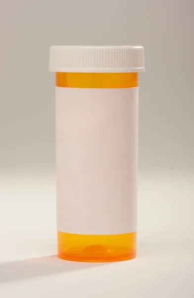 Bottiglia bianca di prescrizione su grigio — Foto Stock