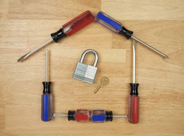 Lock, Key, House Shaped by Screwdrivers — Stock Photo, Image