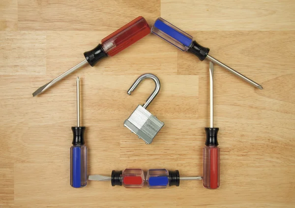 Lock with House Shaped by Screwdrivers — Stock Photo, Image