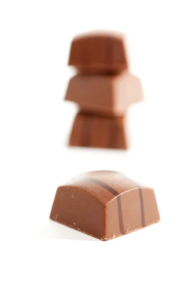 Delicious cioccolatini isolati su bianco — Foto Stock