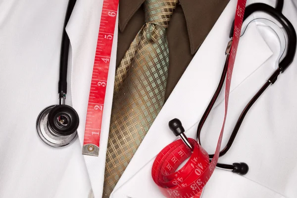 Medico con stetoscopio, Nastro di misurazione — Foto Stock