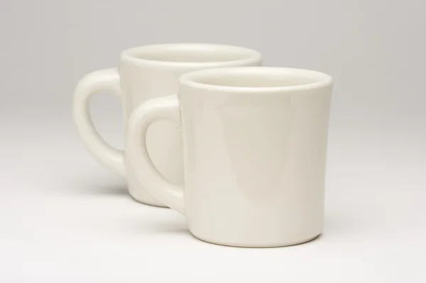 Дві пусті кавові чашки — стокове фото