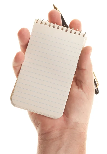 Мужские руки держат ручку и блокнот бумаги Стоковое Фото