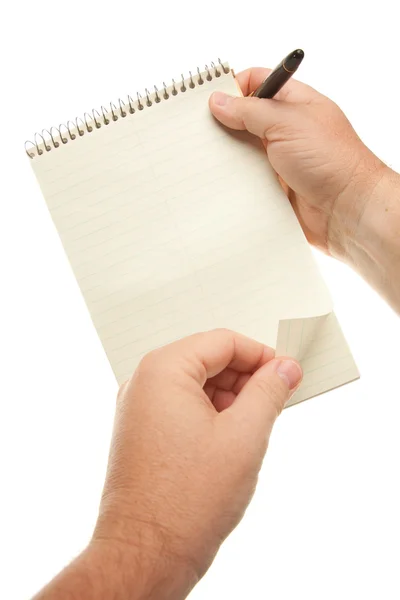 Male Hands Holding Pen and Pad of Paper Stock Image