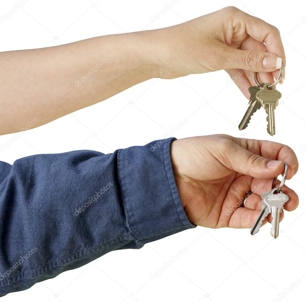 Man and Woman handing over house keys