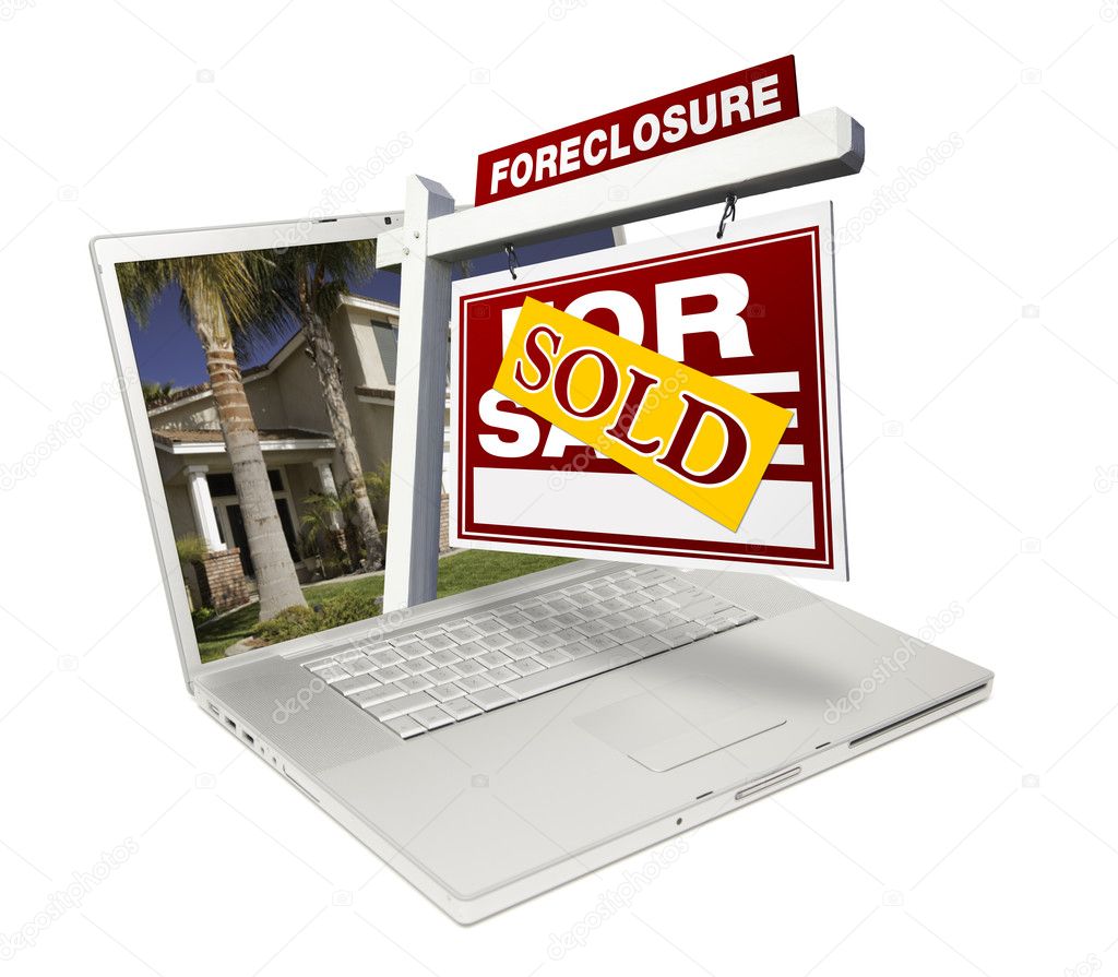 Sold Foreclosure Sign on Laptop