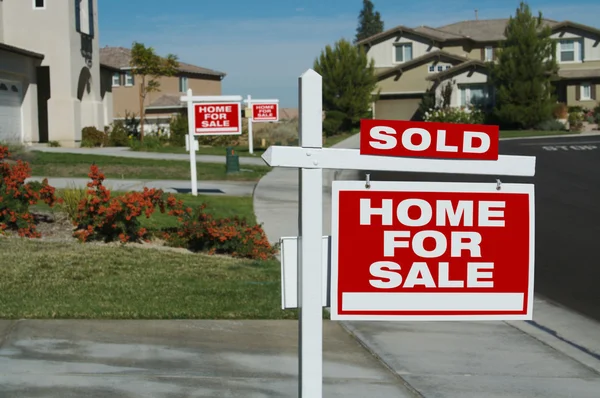 Sold Home For Sale Signs New Houses — Stock Photo, Image