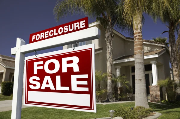 Red Foreclosure Sign and House — Stock Photo, Image