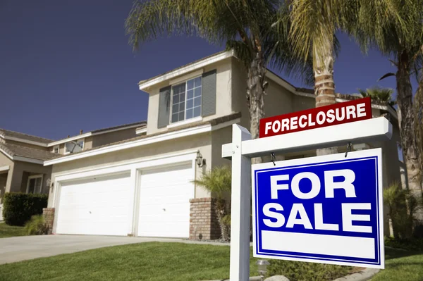 Blue Foreclosure Sign and House — Stock Photo, Image