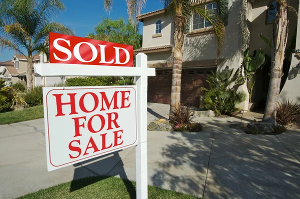 Sold Home For Sale Sign in front of Home — Stock Photo, Image