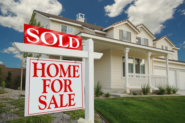 Sold Home For Sale Sign & New House — Stock Photo, Image