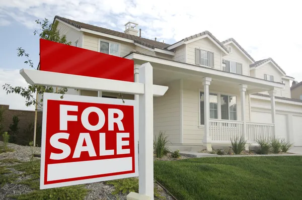 Blank Real Estate Sign in Front of Home Stock Image