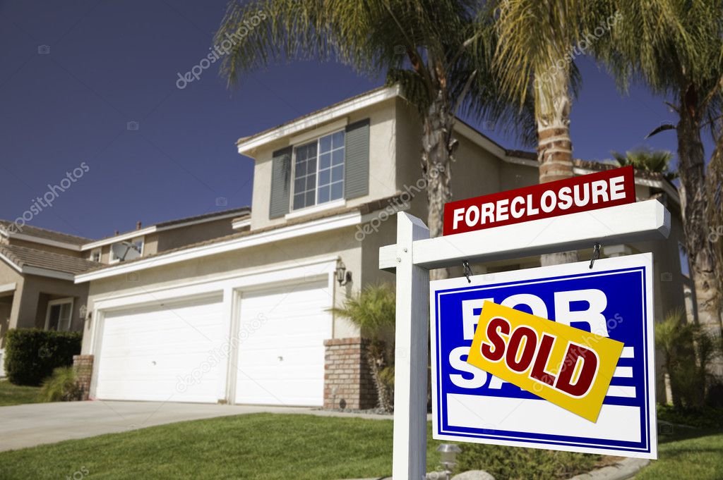 Blue Sold Foreclosure Sign and House