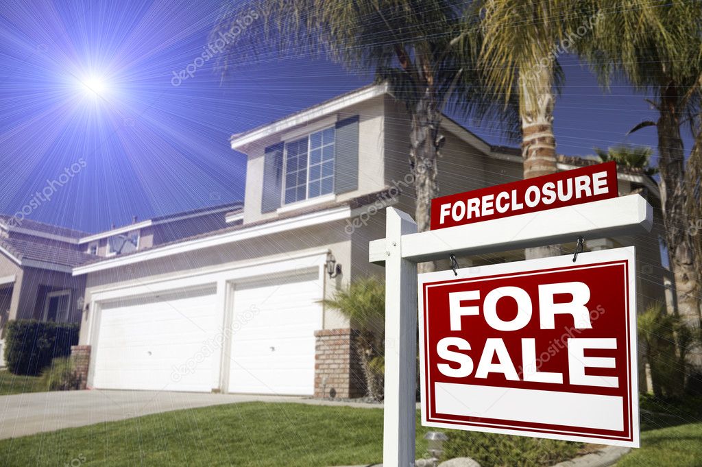 Red Foreclosure Sign and Home
