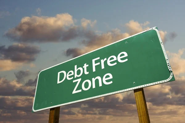 Debt Free Zone Green Road Sign In Front — Stock Photo, Image