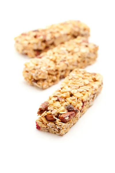 Três barras de granola isoladas em branco — Fotografia de Stock