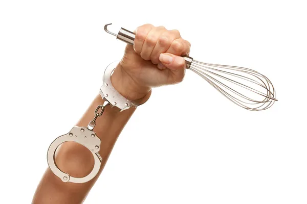 Handcuffed Woman Holding Egg Beater — Stock Photo, Image