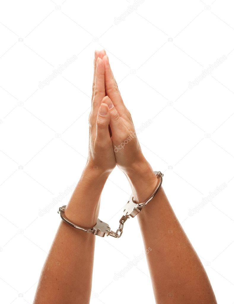 Handcuffed Woman Raises Praying Hands