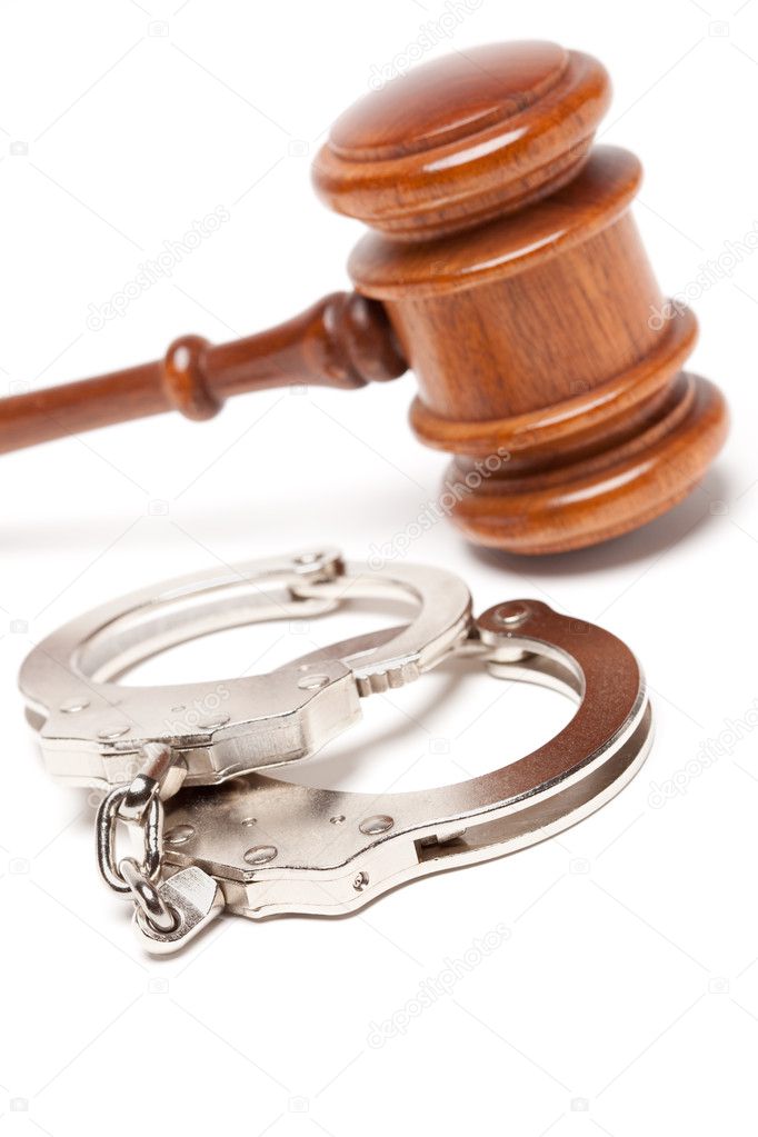 Gavel and Handcuffs Isolated on White