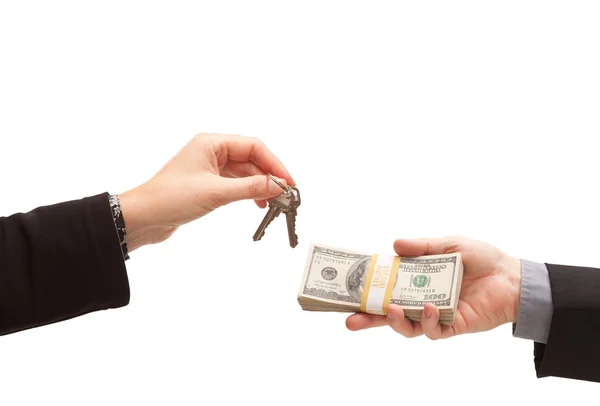 Handing Over Cash For Keys Isolated — Stock Photo, Image