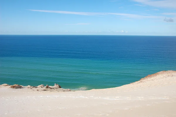 Azure ocean with sand beach — Stock Photo, Image