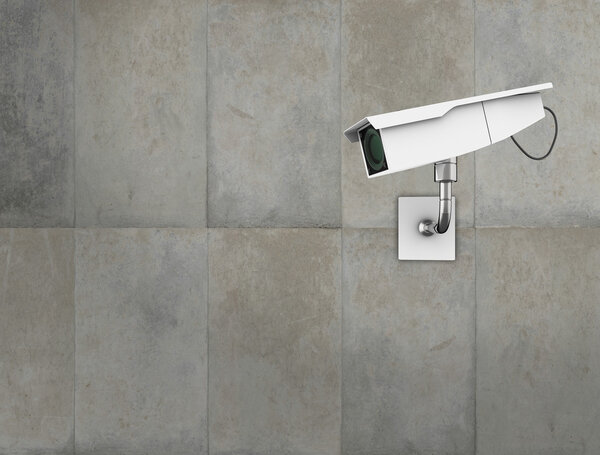 CCTV camera on a concrete wall. High quality 3d illustration.